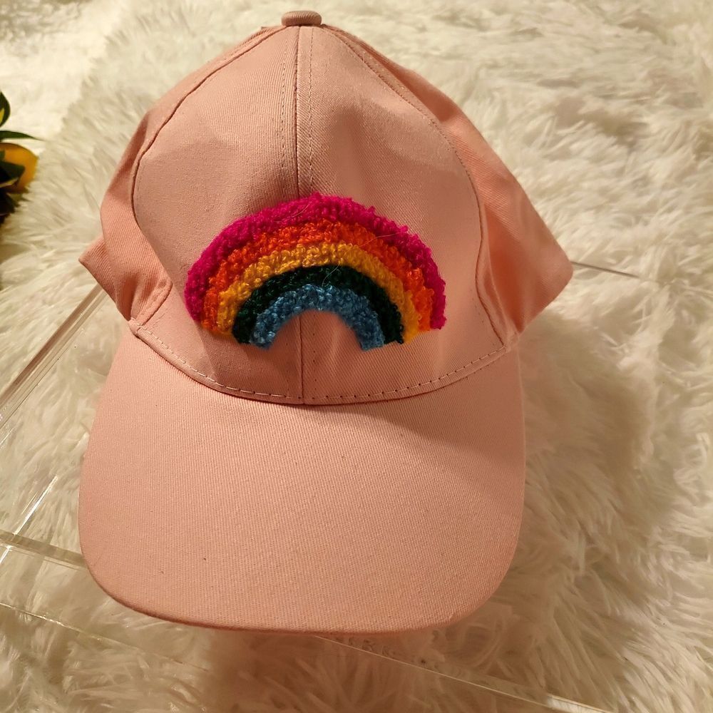 A pink hat with punch needle 🌈 rainbow NWT